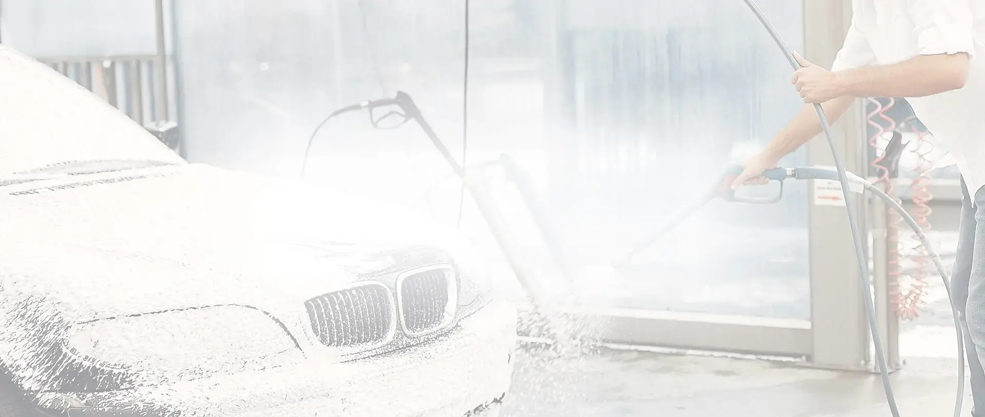 background image of a car being washed